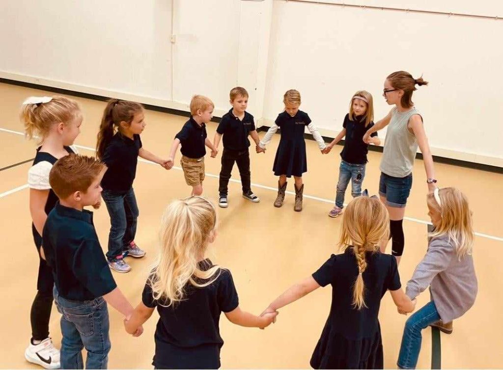 Students and staff gathered at Ivy Academy