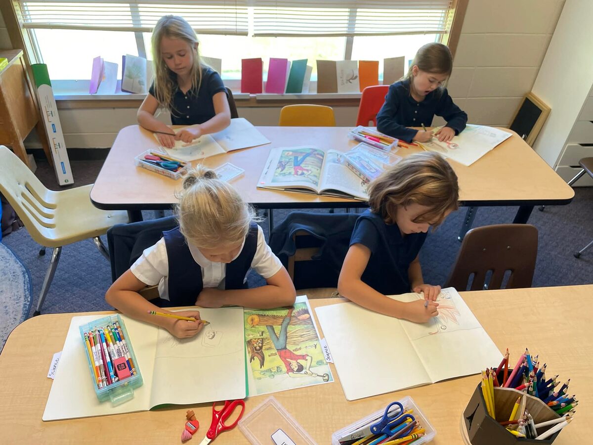 Students working on drawing lessons in the classroom